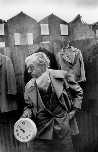 Edward with clock, off Cheshire Street Market, 1983