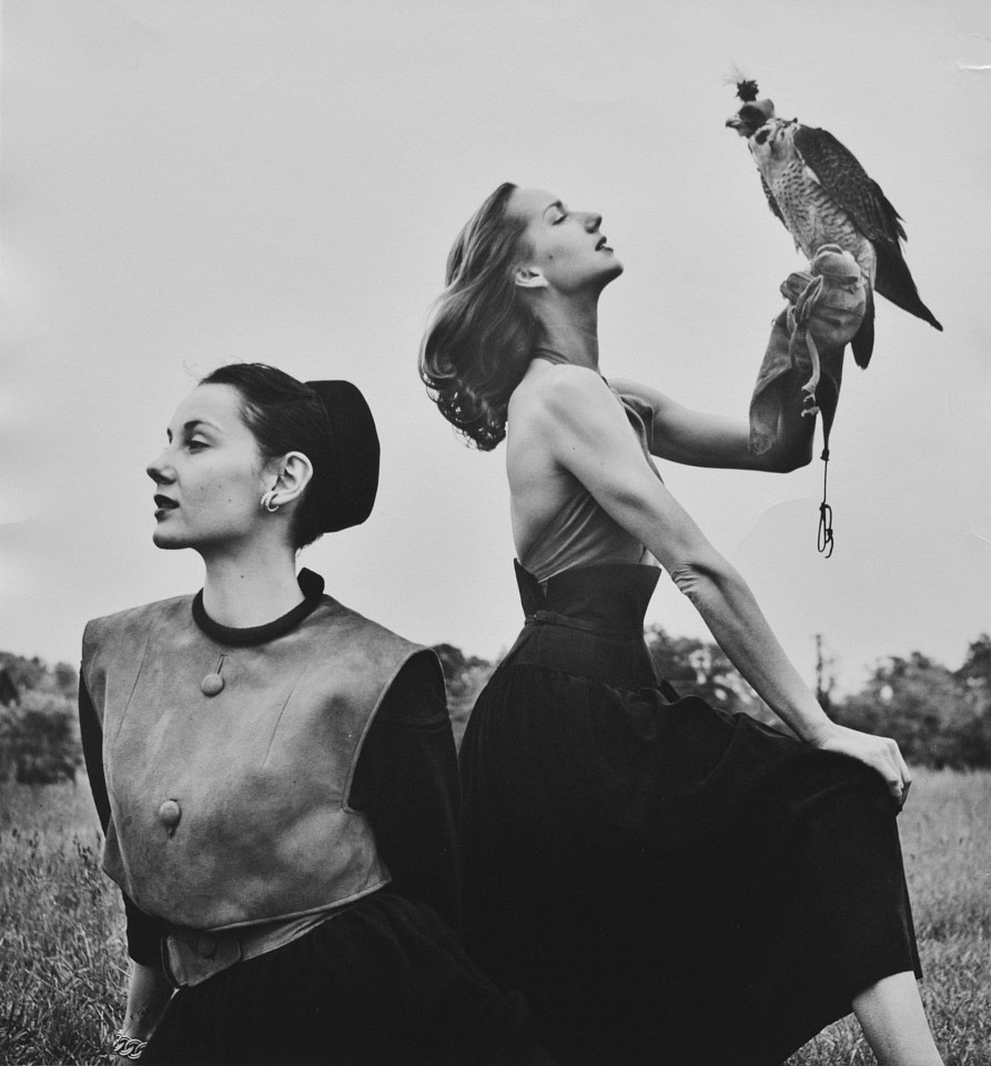 Genevieve NAYLOR, Two women pose with a falcon while modeling suede fashions by Arpad and a hat by Sally Victor, New York,
1946