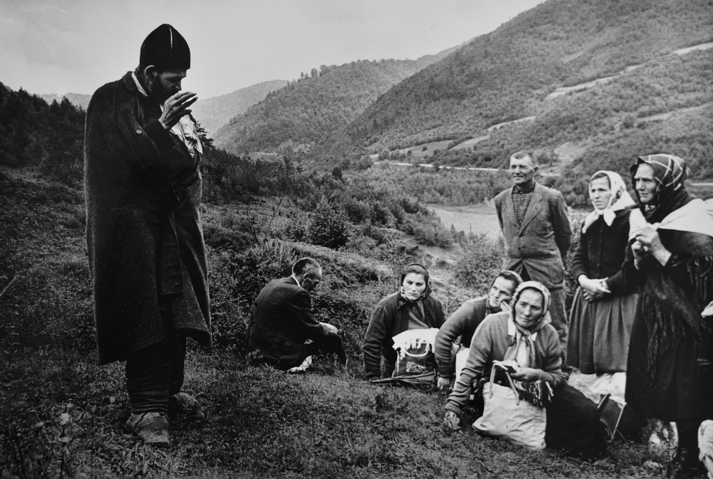 Markéta LUSKACOVA, The pilgrims in Lutina, Slovakia, listening to Mad Jura dressed in priest's cloak. From the series 'Pilgrims, 1964-71'
1965/66, Silver Bromide Print